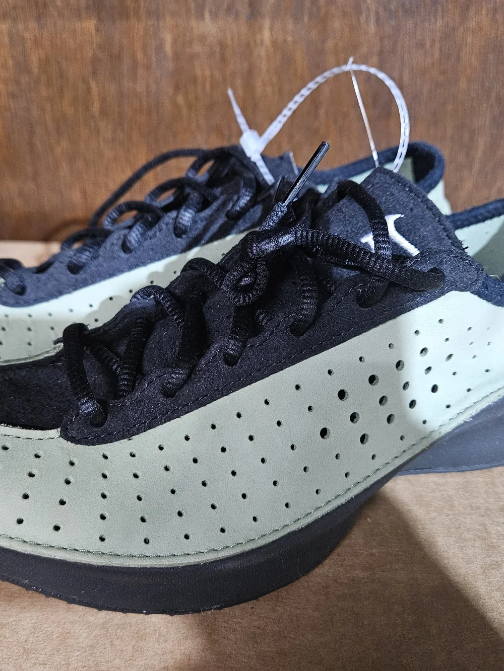 Nike Black and Sage Green Perforated Sneakers